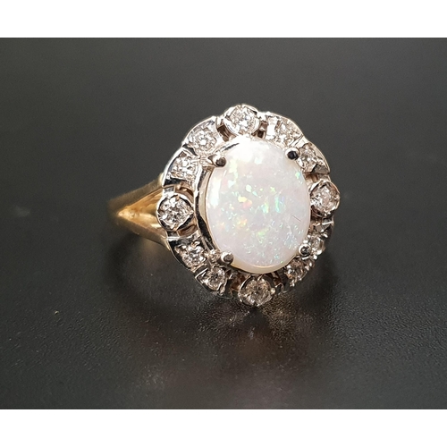 45 - OPAL AND DIAMOND CLUSTER RING
the central oval cabochon opal measuring approximately 9.7mm x 7.5mm, ... 