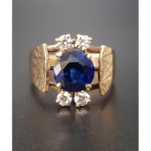 48 - 1970s SAPPHIRE AND DIAMOND DRESS RING
the central round cut sapphire approximately 1.8cts, with two ... 