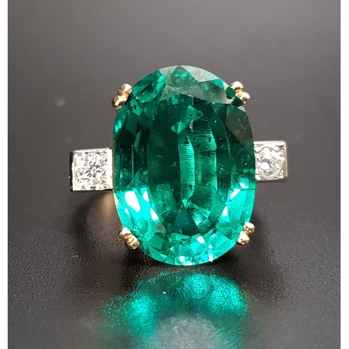 63 - EMERALD TRIPLET AND DIAMOND COCKTAIL RING
the oval cut central emerald triplet measuring 17.8mm x 12... 