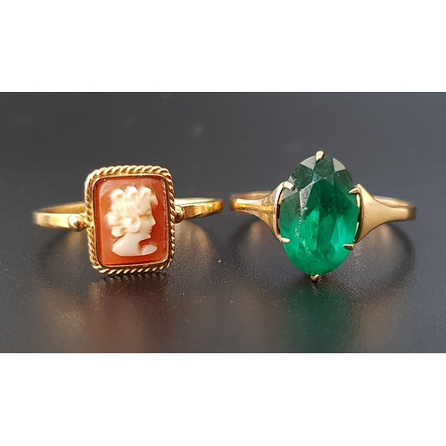 79 - TWO NINE CARAT GOLD RINGS
one set with a small cameo and the other with faceted green glass, ring si... 