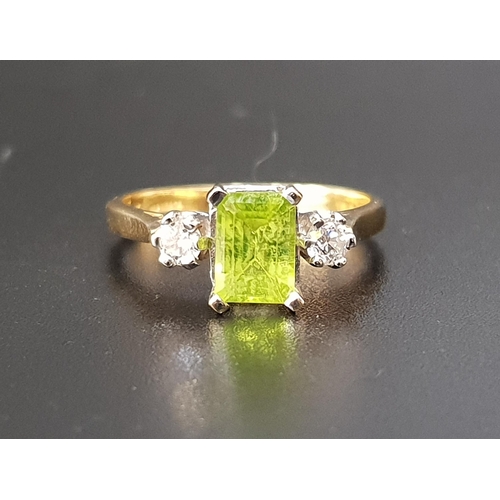 86 - PERIDOT AND DIAMOND THREE STONE RING
the central emerald cut peridot approximately 1ct flanked by ro... 