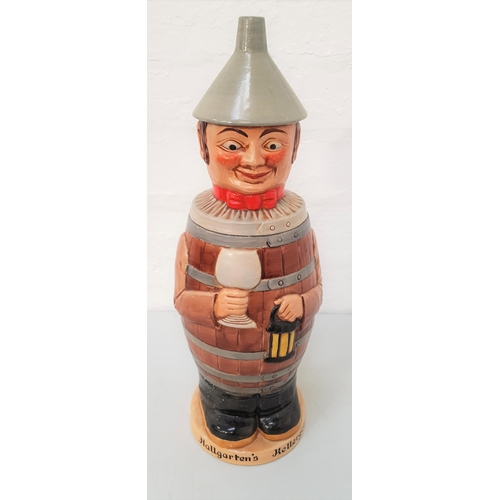 156 - GERMAN POTTERY ADVERTISING JAR AND COVER
depicting a man wearing a barrel and holding a glass and a ... 