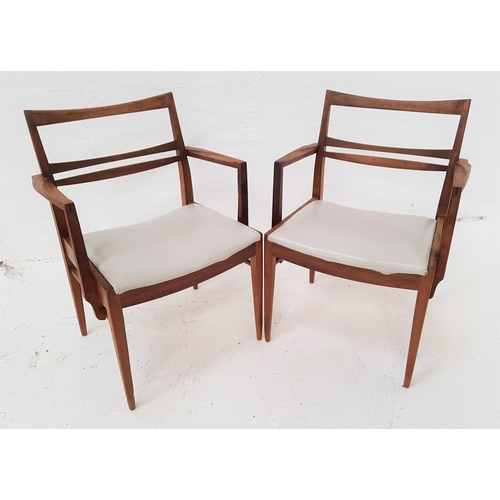 341 - PAIR OF RETRO TEAK ARMCHAIRS
with slatted backs and shaped arms above grey vinyl padded seats, stand... 