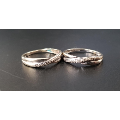 117 - TWO DIAMOND SET CROSSOVER RINGS
both in nine carat gold, ring sizes M and N respectively, total weig... 