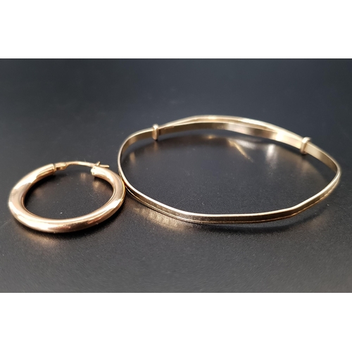 126 - NINE CARAT GOLD CHRISTENING BRACELET
and a single nine carat gold hoop earring, total weight approxi... 