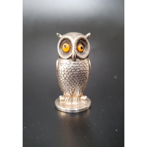 131 - SAMPSON MORDAN SILVER OWL
with feather detail and glass eyes, Chester hallmarks, 3.2cm high