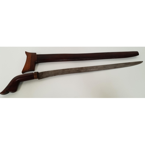 278 - INDONESIAN KRIS
with a teak shaped handle and a 48.5cm long steel blade, with a teak scabbard