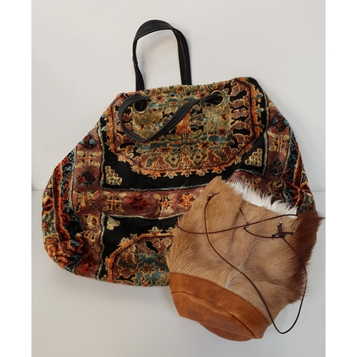 228 - LADYIES CARPET BAG HAND BAG
with leather handle and internal pocket, together with a drawstring Cone... 