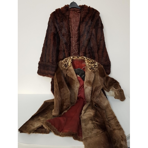 235 - FOUR LADIES CONEY FUR COATS
in brown, camel and cream, together with another fawn fur coat (4)