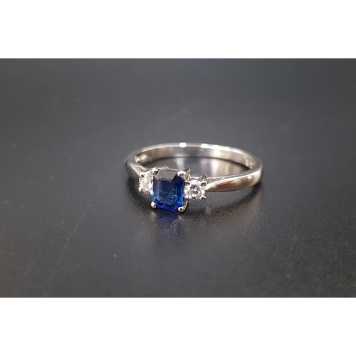 100 - SAPPHIRE AND DIAMOND THREE STONE RING
the central emerald cut sapphire approximately 0.45cts flanked... 