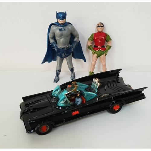 259 - CORGI BATMOBILE DIE CAST VEHICLE
with Batman and Robin figures; together with two plastic character ... 