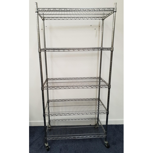 379 - INDUSTRIAL METAL RACKING
with five adjustable slatted shelves, on a wheeled base, 192cm x 90cm