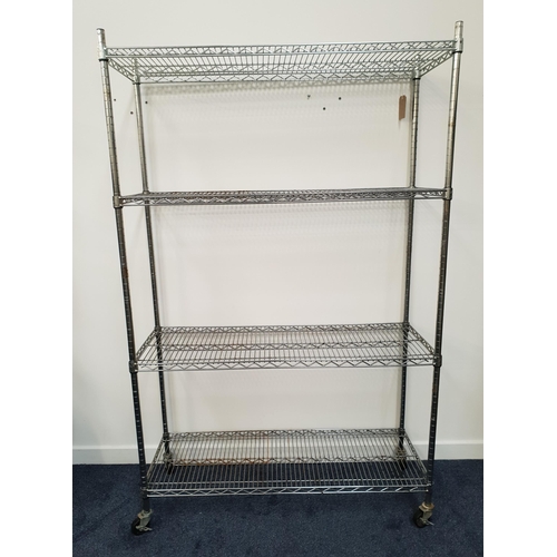 380 - INDUSTRIAL METAL RACKING
with four adjustable slatted shelves, on a wheeled base, 192cm x 120cm