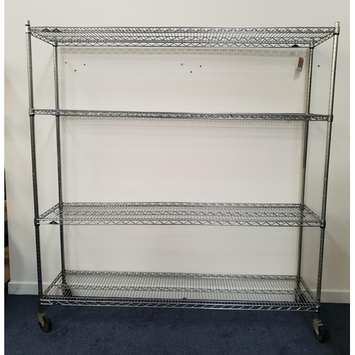 382 - LARGE INDUSTRIAL METAL RACKING
with four adjustable slatted shelves, on a wheeled base, 194cm x 182c... 