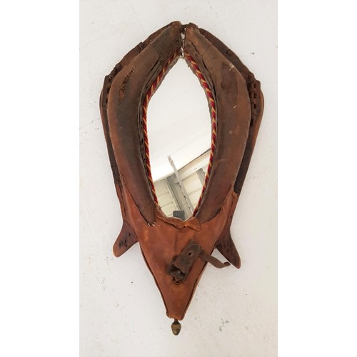 329 - VINTAGE LEATHER HORSE COLLAR
with original metal fixings, now fitted with a decorative shaped mirror... 