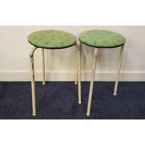 375 - PAIR OF 1950S KITCHEN STOOLS
with circular green vinyl padded seats decorated with gold and black sp... 