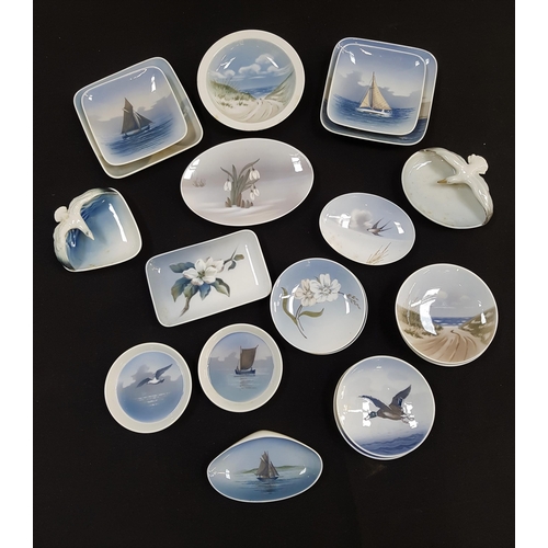 148 - SELECTION OF ROYAL COPENHAGEN PIN DISHES
decorated with flowers, birds, boats and landscapes (16) to... 