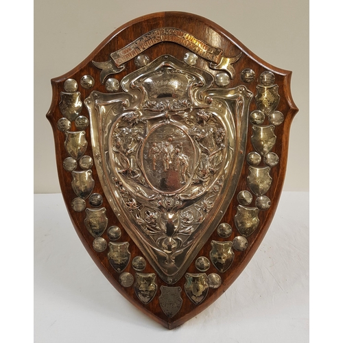 259 - THE GLASGOW AND DISTRICT FORMER PUPILS FOOTBALL LEAGUE CHALLENGE SHIELD
the oak shaped shield with a... 