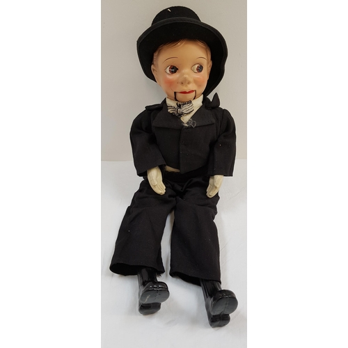 283 - VENTRILOQUIST DUMMY
with a moulded plastic head and jointed lower jaw, dressed in a morning coat, ma... 