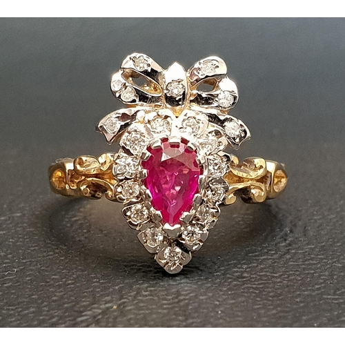 71 - UNUSUAL RUBY AND DIAMOND CLUSTER RING
the pear cut ruby in diamond surround and surmounted by a diam... 