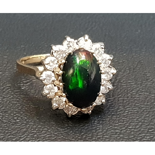 79 - UNUSUAL BLACK OPAL AND DIAMOND CLUSTER RING
the central oval cabochon opal in fourteen diamond surro... 