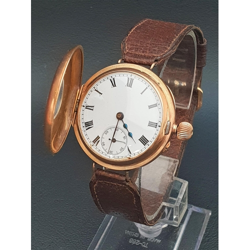 64 - CONTINENTAL TWELVE CARAT GOLD HALF HUNTER WRISTWATCH
the white enamel dial with Roman numerals and s... 