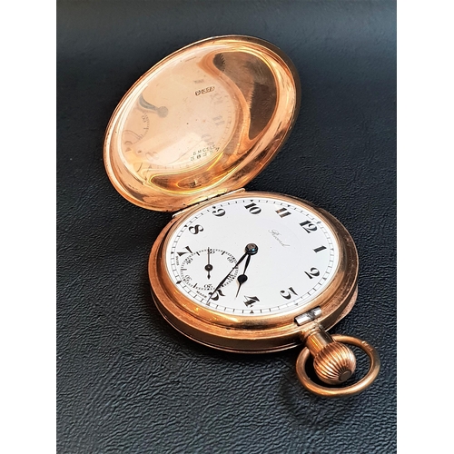 75 - NINE CARAT GOLD 'RECORD' FULL HUNTER POCKET WATCH
the white enamel dial with Roman numerals and subs...