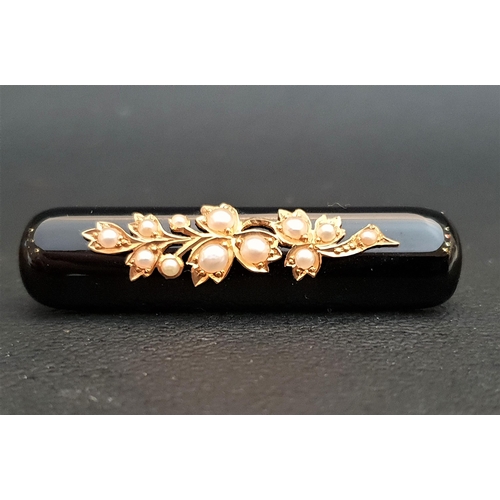 66 - BLACK AGATE AND SEED PEARL MOURNING BROOCH
the agate bar with seed pearl set floral decoration, the ... 