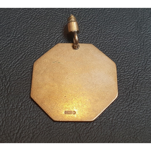 117 - NINE CARAT GOLD OCTAGONAL MEDAL FOB
with engraved detail, approximately 7.7 grams