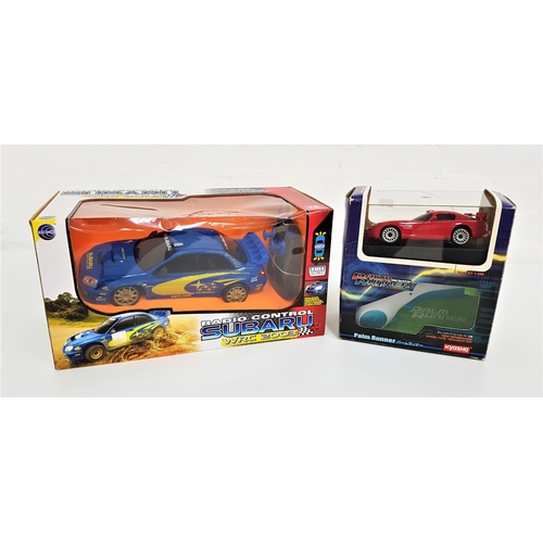 288 - RADIO CONTROL SUBARU WRC 2003 IMPREZA
in original box, new and unused, together with a radio control... 