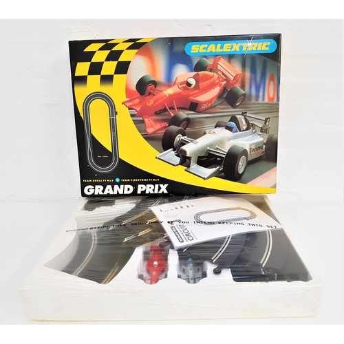 289 - SCALEXTRIC GRAND PRIX EDITION
featuring Team Shell and Team Firestone, in original box, new and unus... 