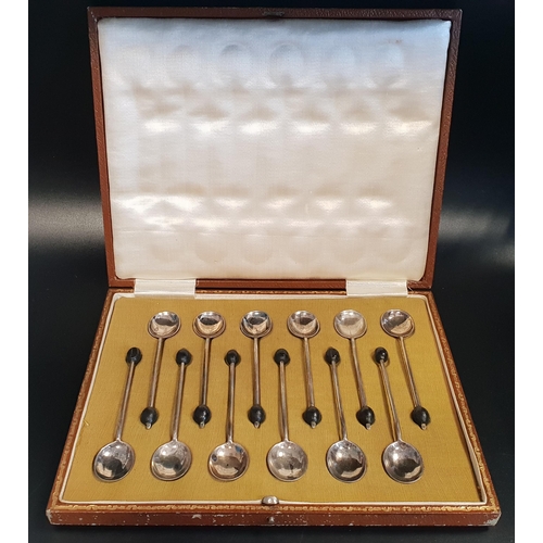 133 - SET OF TWELVE GEORGE V SILVER COFFEE BEAN SPOONS
cased, Sheffield 1920 by Cooper Brother & Sons Ltd,... 