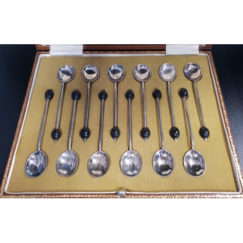 133 - SET OF TWELVE GEORGE V SILVER COFFEE BEAN SPOONS
cased, Sheffield 1920 by Cooper Brother & Sons Ltd,... 