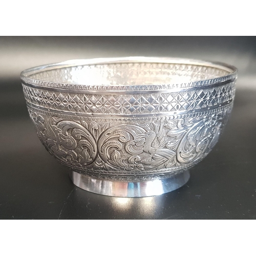 136 - VICTORIAN SILVER BOWL
with embossed floral, scroll and motif decoration overall,  Edinburgh hallmark... 