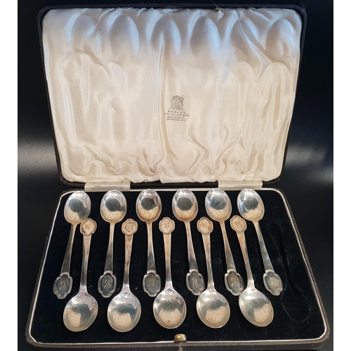 139 - SET OF ELEVEN SILVER TEASPOONS 
Sheffield 1936, all with italic letter C to finial, (one lacking fro... 