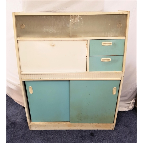 369 - 1950s REMPLOY KITCHEN CABINET
with a pair of angled glass sliding doors above a drop flap and two dr... 