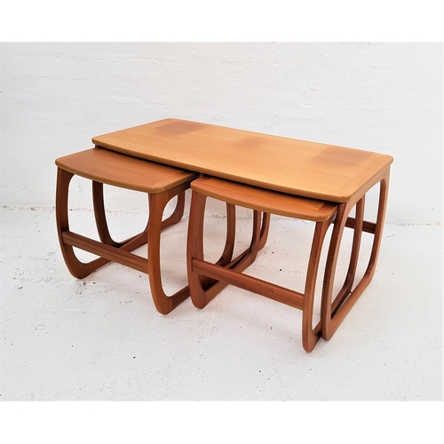 396 - NATHAN TEAK NEST OF TABLES
standing on shaped supports, 51cm high