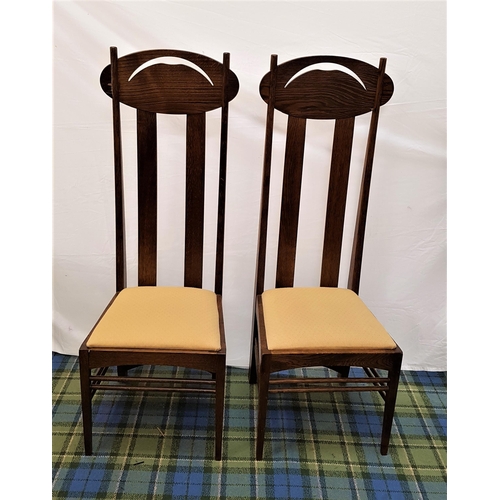 407 - PAIR OF RENNIE MACKINTOSH STYLE OAK DINING CHAIRS
in the Argyle design with inset padded seats (2)