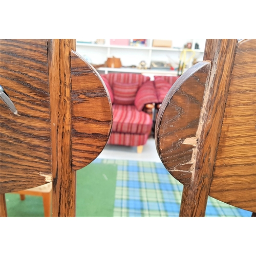 407 - PAIR OF RENNIE MACKINTOSH STYLE OAK DINING CHAIRS
in the Argyle design with inset padded seats (2)