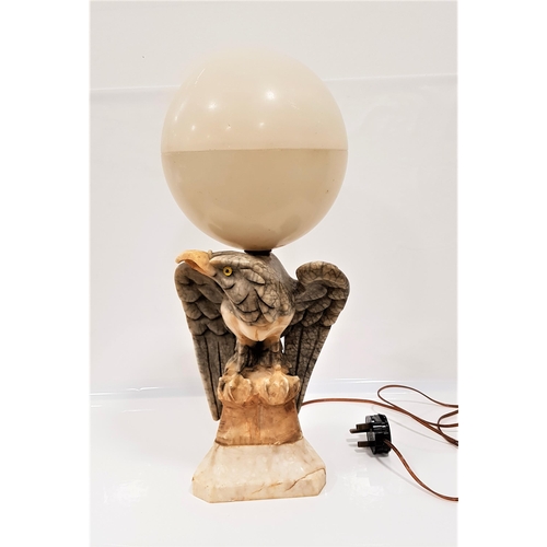 408 - ART DECO ALABASTER TABLE LAMP
carved as an eagle with a circular alabaster two piece shade, 45cm hig... 