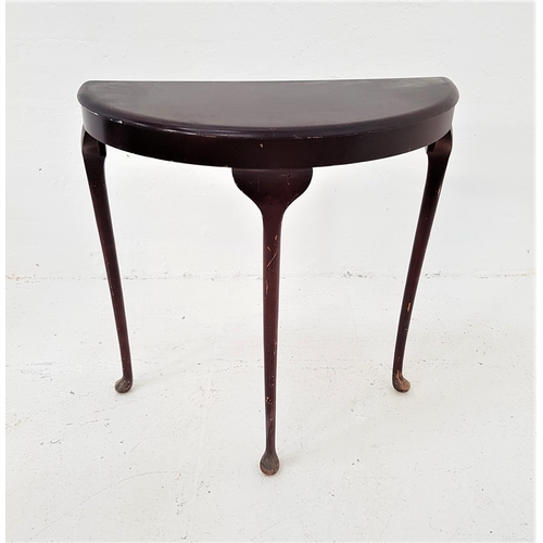 410 - SIMULATED ROSEWOOD SIDE TABLE
with a D shaped top, standing on three cabriole supports, 73cm high