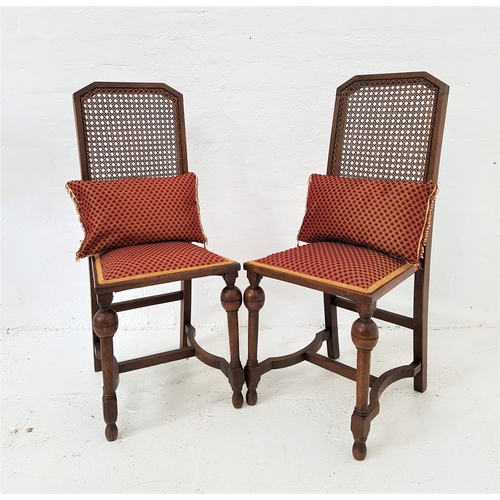 413 - PAIR OF OAK SIDE CHAIRS
with caned backs above padded seats, standing on turned front supports unite... 