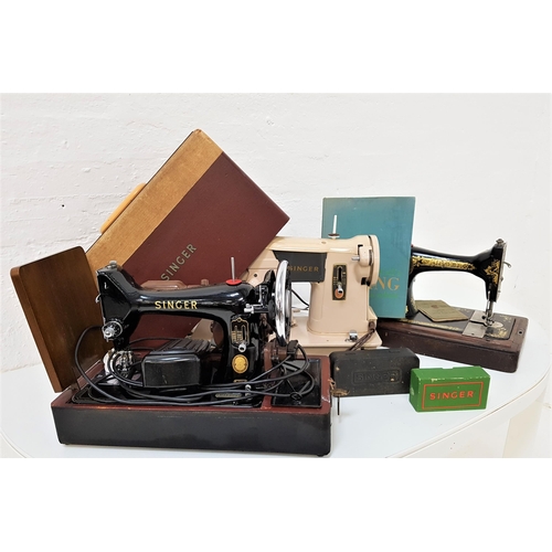 239 - VINTAGE SINGER SEWING MACHINE
with hand operated wheel and various parts, an electric Singer sewing ... 