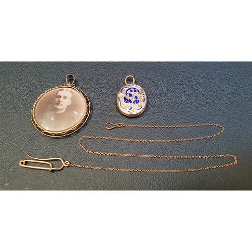 119 - TWO GOLD LOCKET PENDANTS
one with glazed circular panels on each side in nine carat gold mount, the ... 