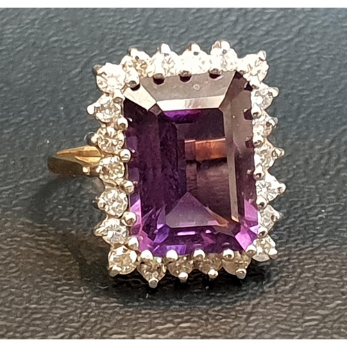 58 - IMPRESSIVE AMETHYST AND DIAMOND CLUSTER RING
the central emerald cut amethyst measuring approximatel... 