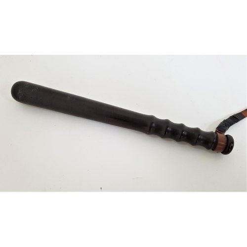 211 - HARDWOOD TRUNCHEON
with a ribbed grip and leather wrist strap, 38cm long