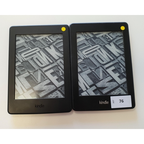 76 - TWO KINDLE E-READERS
comprising a Kindle Paperwhite 3, serial number G090 G105 7012 057S; and a Kind... 