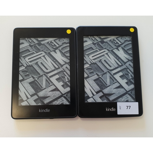 77 - TWO KINDLE E-READERS
comprising a Kindle Paperwhite 4, serial number G850 PP12 1286 04XS; and a Kind... 