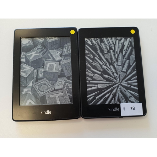 78 - TWO KINDLE E-READERS
comprising a Kindle Paperwhite 4, serial number G000 PP13 0414 0E68; and a Kind... 