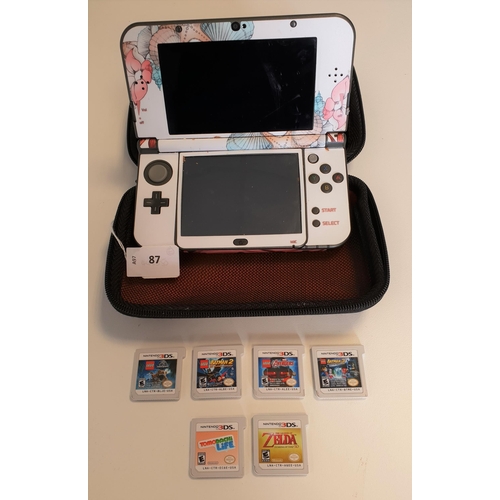 87 - NINTENDO 3DS HANDHELD GAME CONSOLE
together with six games